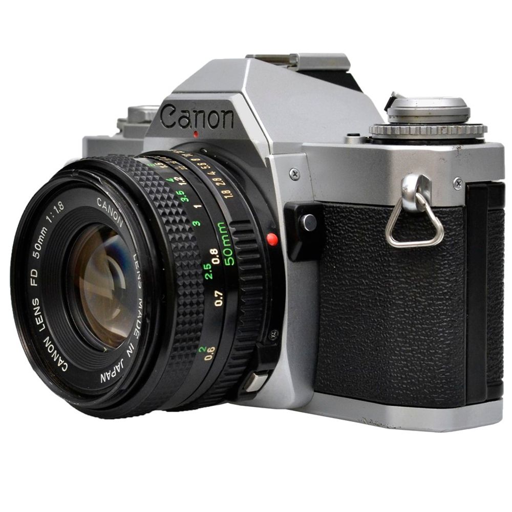 CÂMERA CANON AV1 COM OBJETIVA FD 50MM F/1.8 USADA Analógica